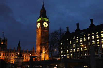 Low angle view of big ben against sky at night