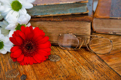 High angle view of red rose on table