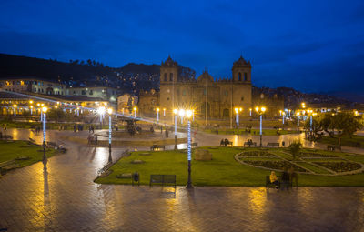 Illuminated buildings in city at night