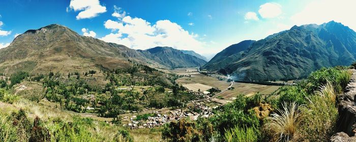 Panoramic view of landscape and mountains against sky