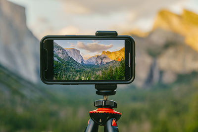 Phone taking picture of yosemite national park in northern california.