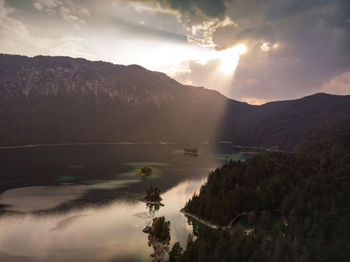 Panoramic view of lake against sky during sunset