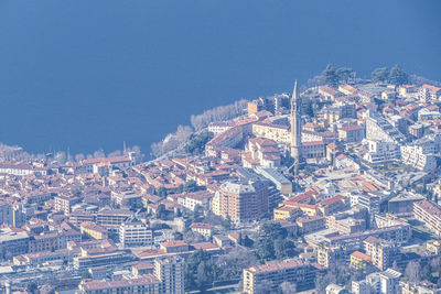 High angle view of townscape against clear blue sky