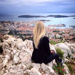 Woman looking at cityscape