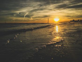 Scenic view of sea against sky during sunset