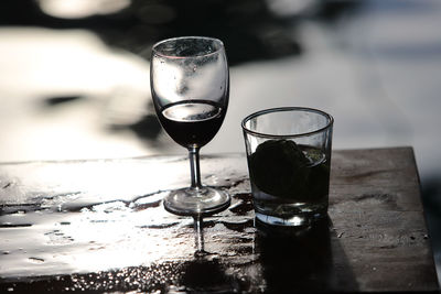 Close-up of wine in glass on table