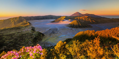 Scenic view of volcanic crater during sunset