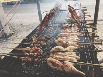 Close-up of meat on grill