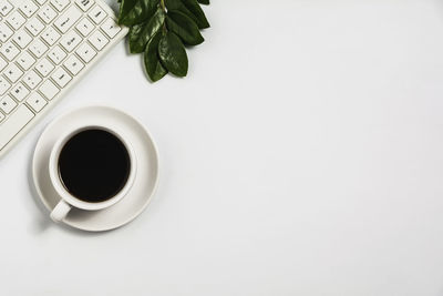 Directly above shot of coffee cup on table