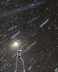 High angle view of illuminated street during winter