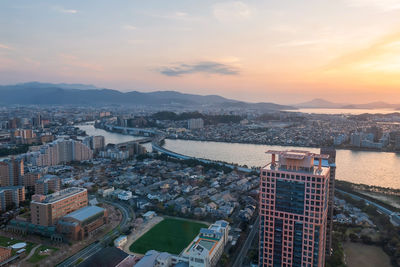 Skyline cityscape view from fukuoka tower at sunset golden hour, kyshu, japan. downtown landscape