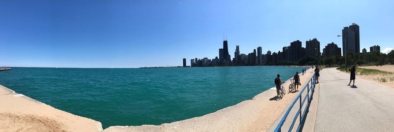 Panoramic view of lake against blue sky