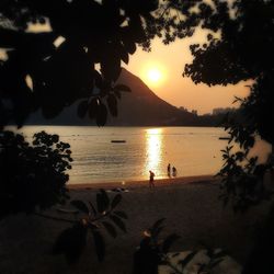 Scenic view of sunset over river