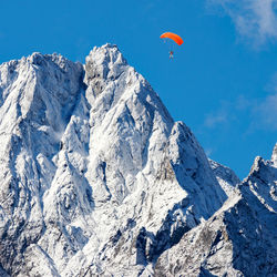 Scenic view of snowcapped mountain against sky