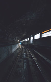 View of railroad tracks in tunnel