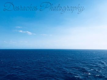 Scenic view of blue sea against sky