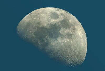 Low angle view of moon against sky at night