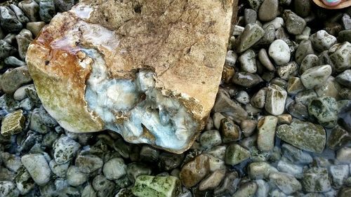 High angle view of stones on rock