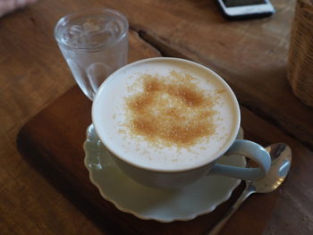 Close-up of coffee cup on table