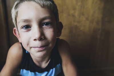 Portrait of confident boy at home