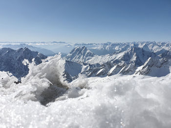 Scenic view of snowcapped mountains against sky