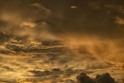 Low angle view of clouds in sky during sunset