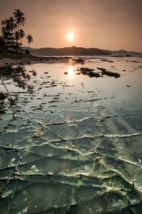 Scenic view of sea against sky during sunset