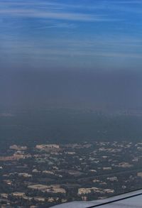 Aerial view of cityscape against sky