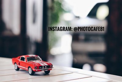 Close-up of toy car on road