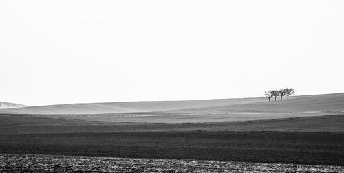 Scenic view of land against clear sky