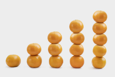 Close-up of eggs on white background