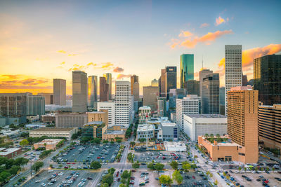 Cityscape against sky during sunset