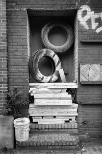 Stack of old building against wall