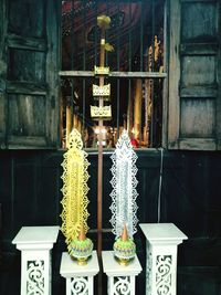 Illuminated lanterns hanging outside building