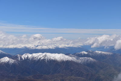 Scenic view of snowcapped mountains against sky