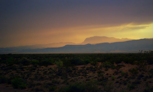 Scenic view of mountains at sunset