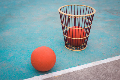 High angle view of basketball hoop against blue wall