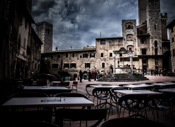 Buildings in city against sky