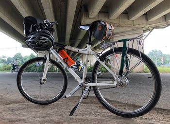 Bicycle parked against wall