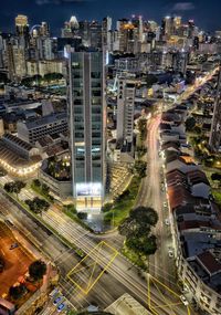 High angle view of illuminated buildings in city