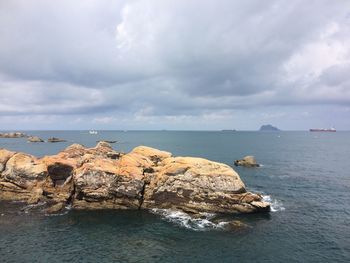 Scenic view of sea and rock formation