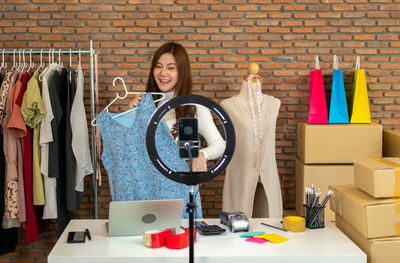 Portrait of woman standing in store