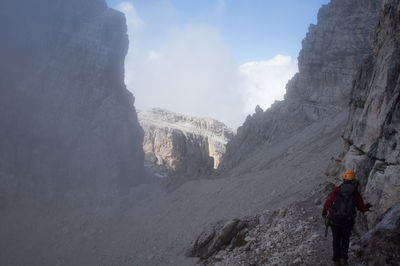Tourists hiking on mountain