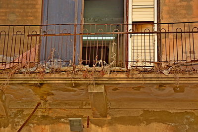 Abandoned building seen through broken window