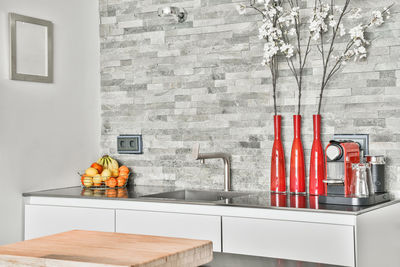 View of fruits on table against wall at home