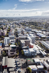 High angle view of buildings against sky in city