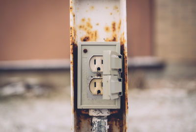 Close-up of camera against sea