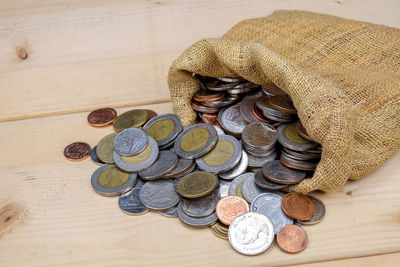 High angle view of coins on table