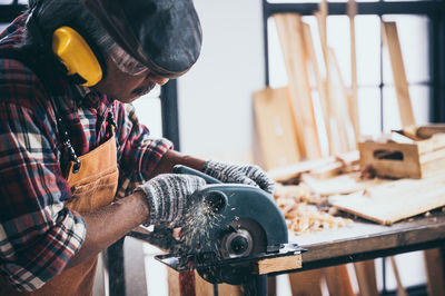 Man working on wood