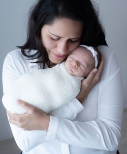 Portrait of a mother with baby